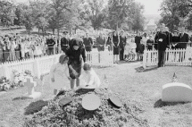 Jackie and Children Light an Eternal Flame