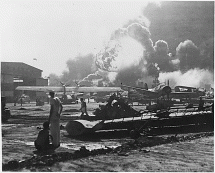 Pearl Harbor Attack - Planes Burn at Hickam Field