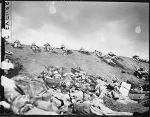 Marines Moving Slowly Over Volcanic-ash Terrain