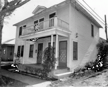 Oswald's Home on West Neely - Posed with Rifle