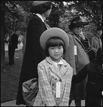 Evacuees Dressed in Finest Clothes