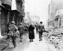 War-weary Citizens Survey Damage