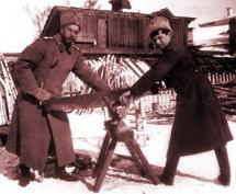 Nicholas and Alexei - Cutting Wood