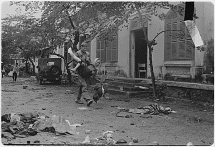 Marine Carries Injured Civilian in Hue